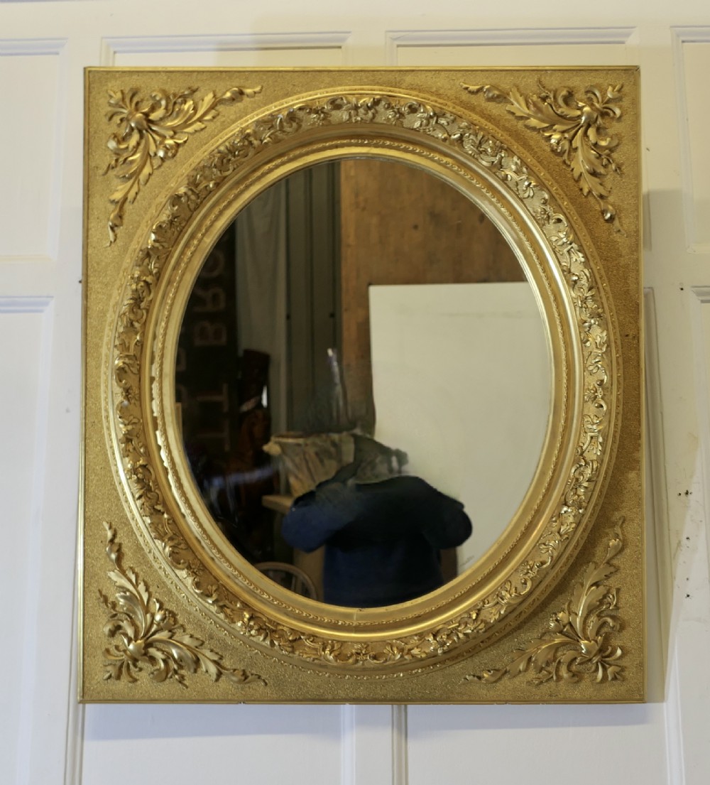 Large Very Decorative Gilt Oval Panel Mirror