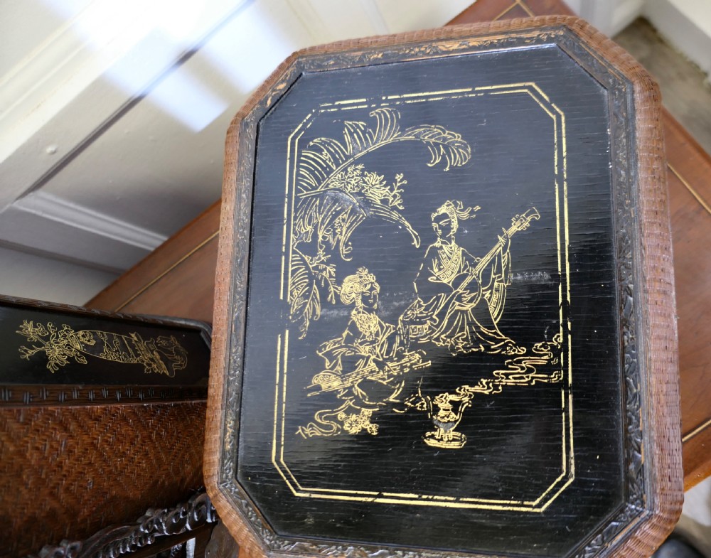 An octagonal Chinese wedding basket constructed from woven bamboo and dark lacquered wood with a tall overhead handle and double doors at the base. View VII