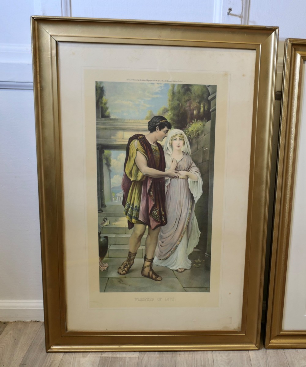 A set of three 19th-century framed Pre-Raphaelite style prints displaying romantic couples in classical attire within gilded frames. View II
