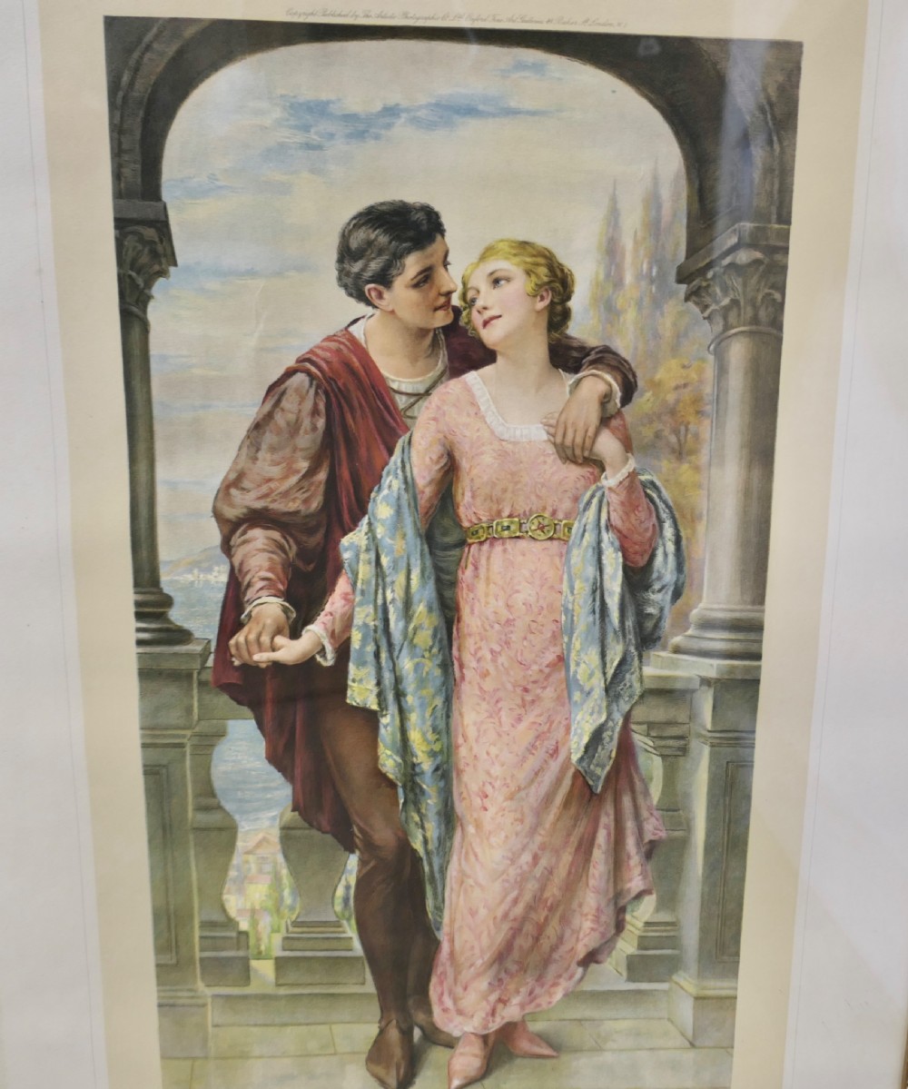 A set of three 19th-century framed Pre-Raphaelite style prints displaying romantic couples in classical attire within gilded frames. View V