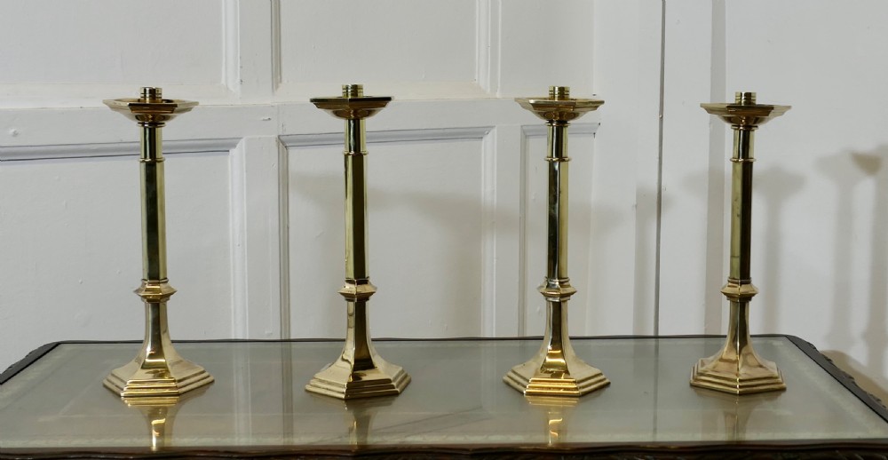 Four Arts and Crafts Brass Candle Sticks