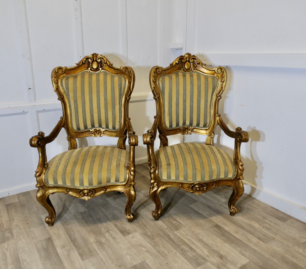 A Pair of Large Italian Carved GiltWood Arm Chairs View III