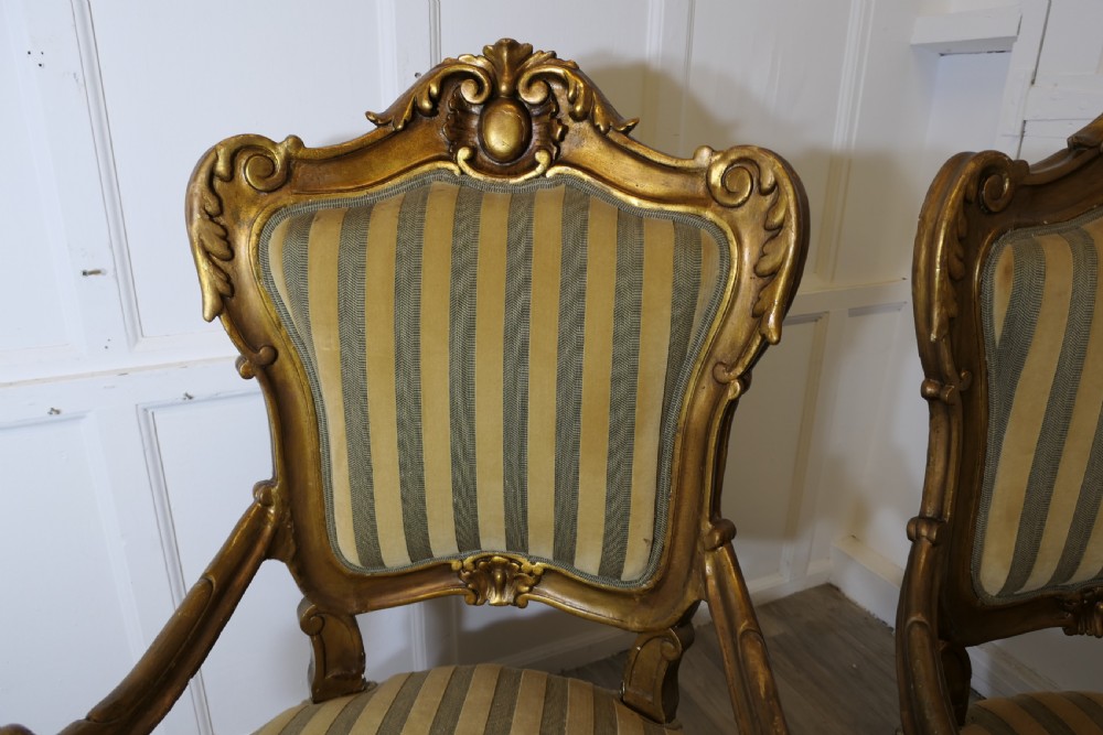 A Pair of Large Italian Carved GiltWood Arm Chairs View IV