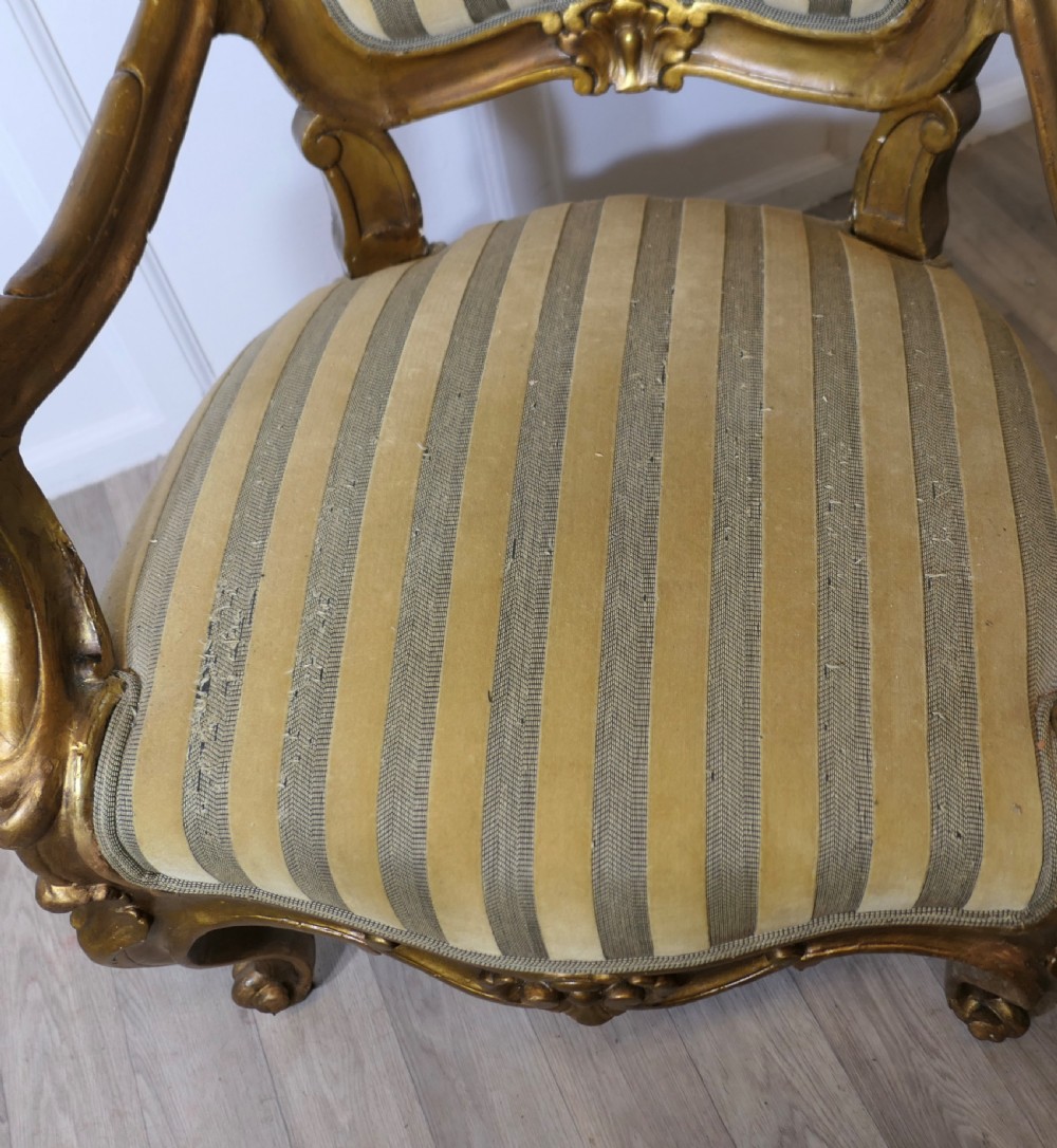 A Pair of Large Italian Carved GiltWood Arm Chairs View V