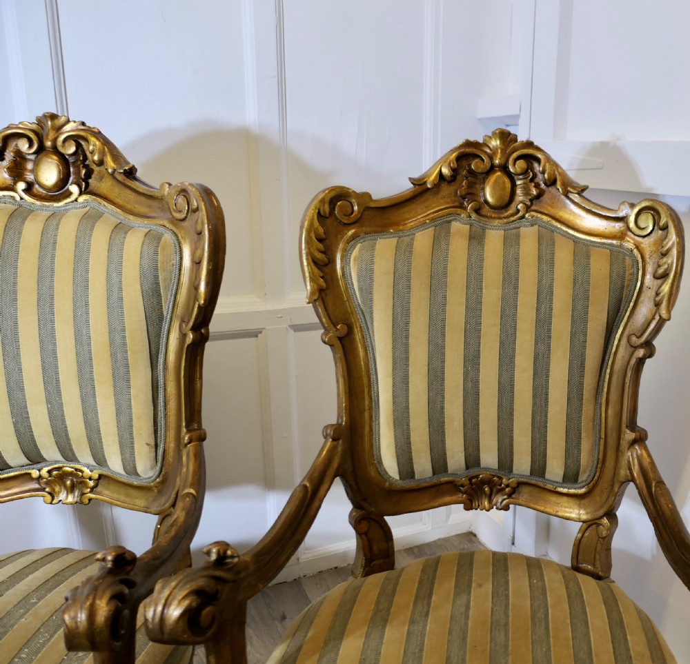 A Pair of Large Italian Carved GiltWood Arm Chairs View VI