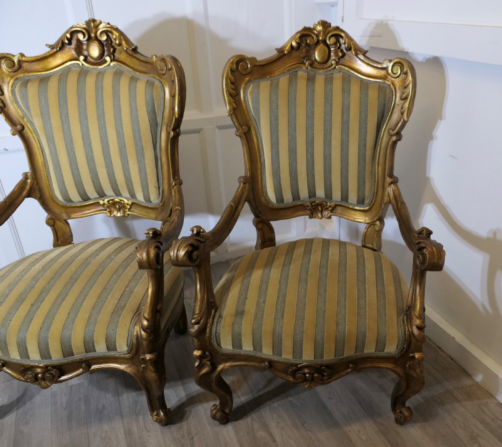 A Pair of Large Italian Carved GiltWood Arm Chairs View VII