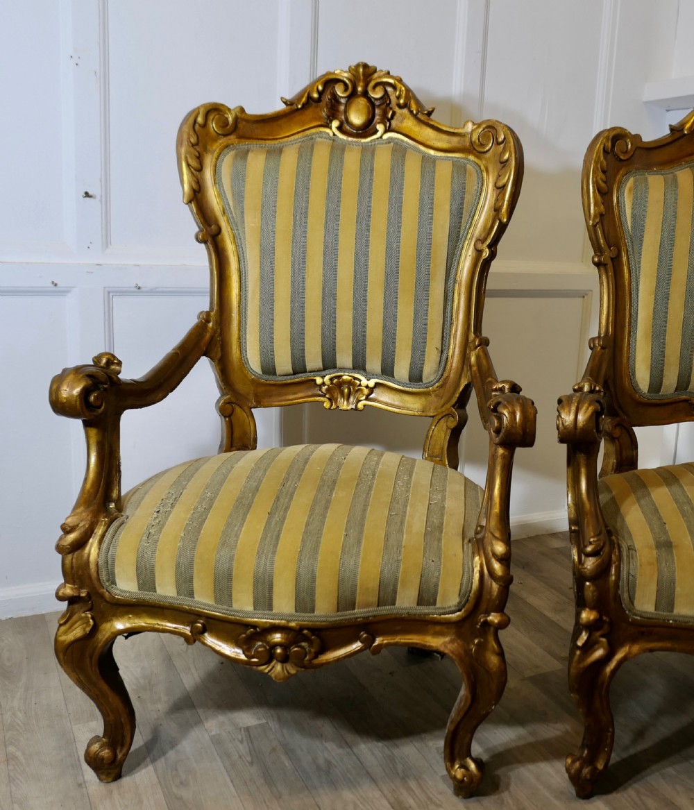 A Pair of Large Italian Carved GiltWood Arm Chairs View VIII