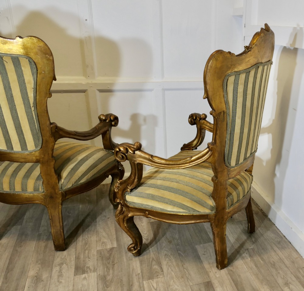 A Pair of Large Italian Carved GiltWood Arm Chairs View XI