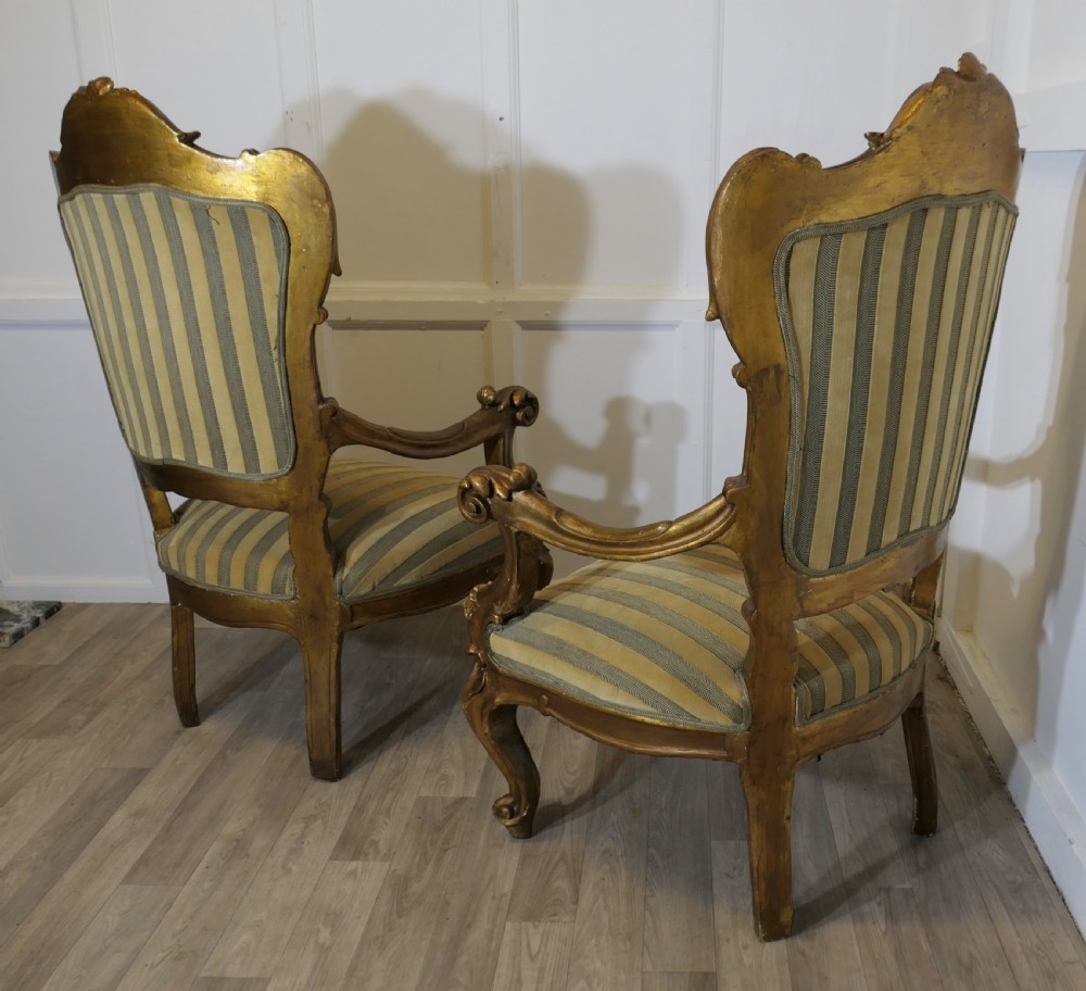 A Pair of Large Italian Carved GiltWood Arm Chairs View XII