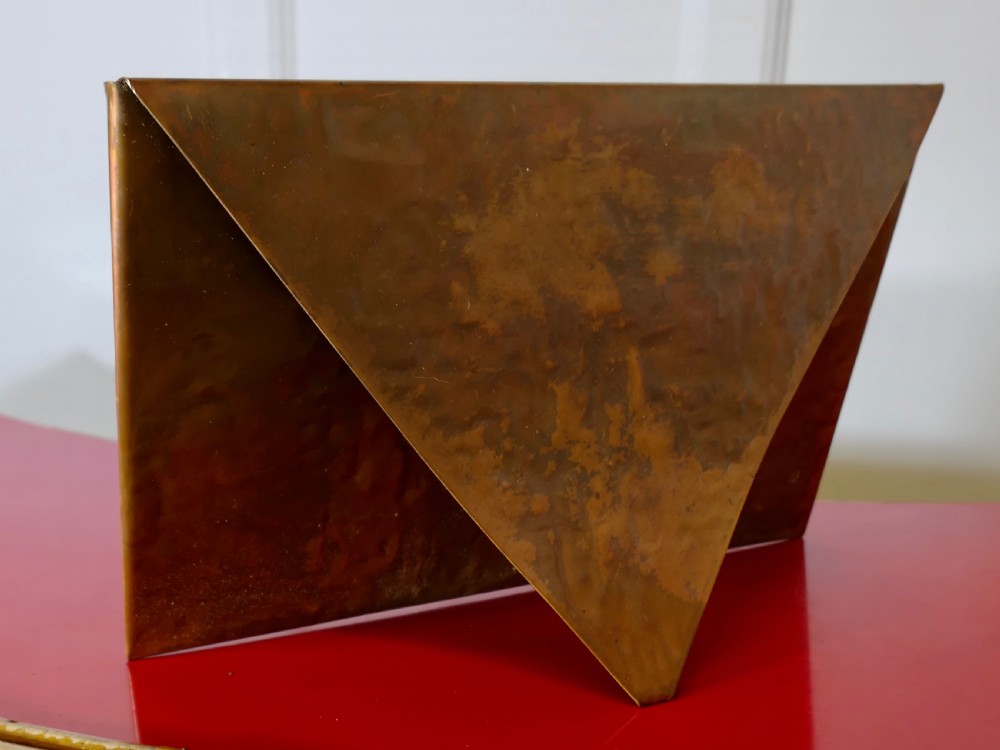A hammered copper letter rack fashioned in the shape of an envelope, featuring a brass rivet and clasp detail. View III