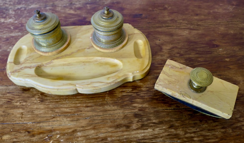 A French veined marble inkstand featuring two turned brass inkpots and a matching rectangular marble rocker blotter set on a shaped base. View III