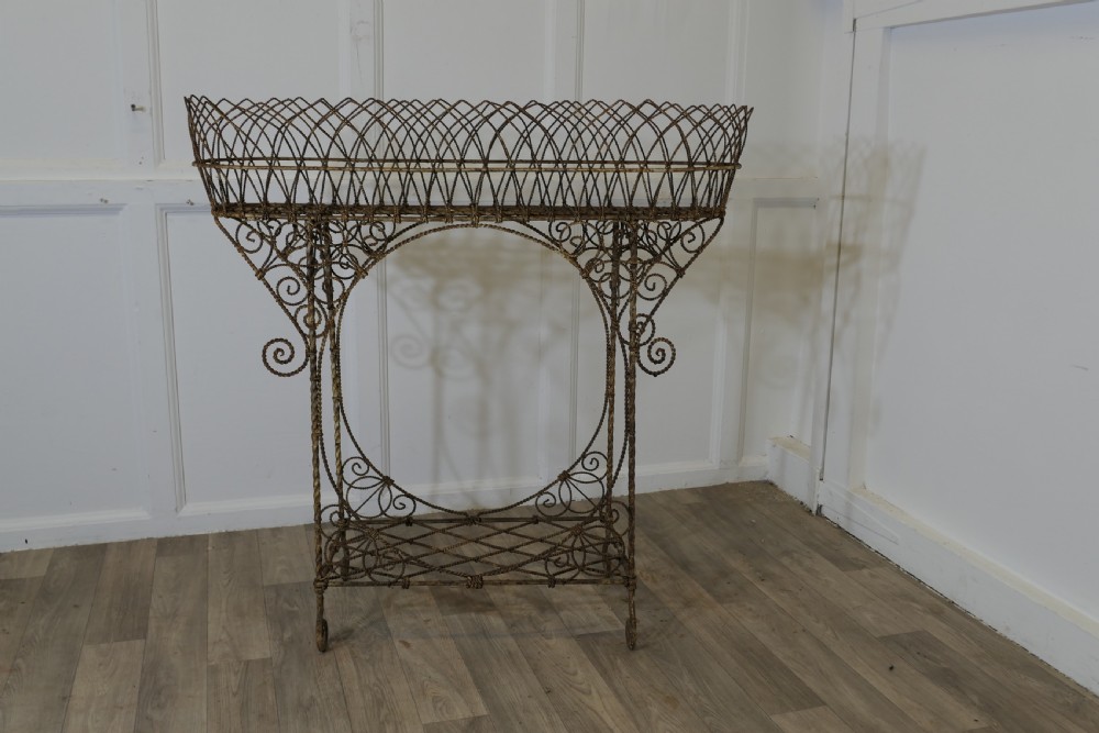 A Regency Wire Work Plant Stand