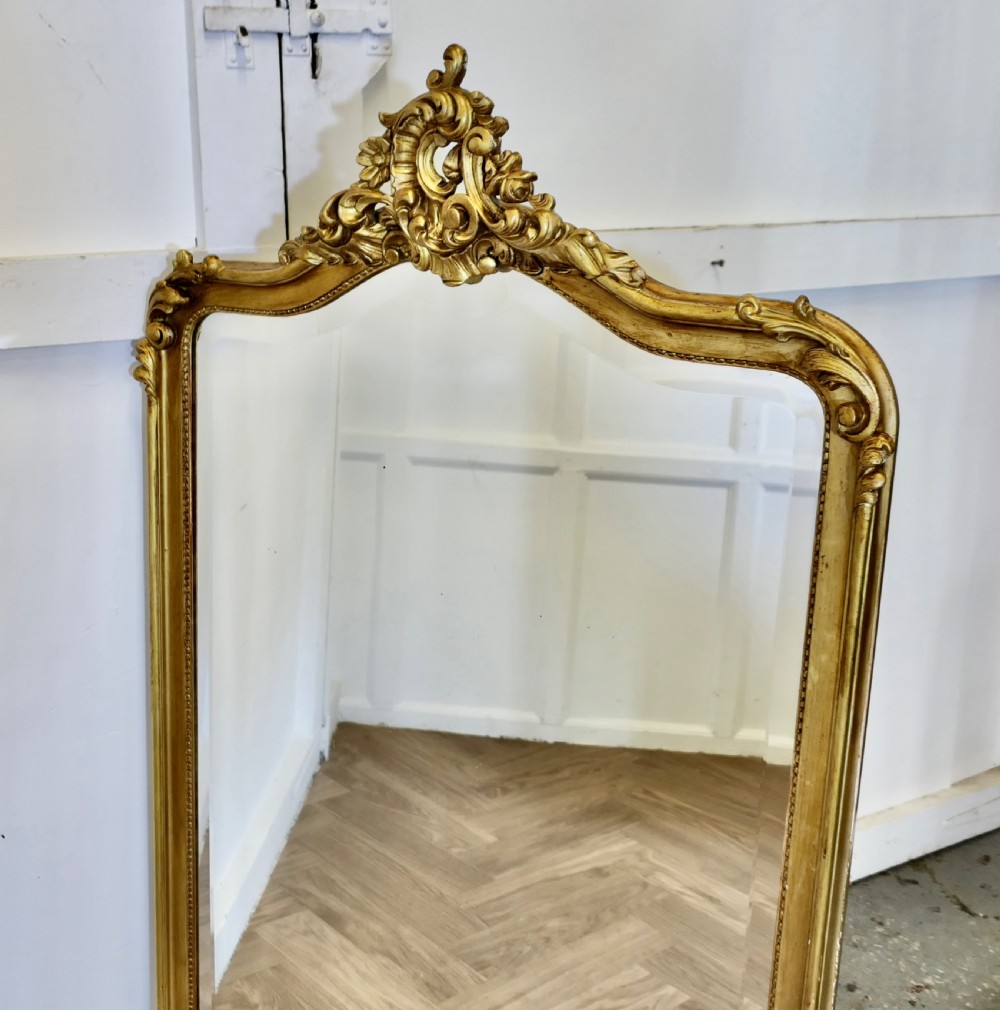 A Large Elaborate French Rococo Gilt Console Mirror Decorated with Leaves and Scrolls  View VI