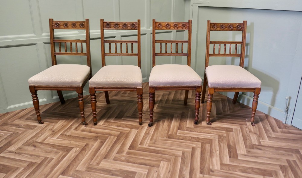 Set of 4 Arts and Crafts Carved Oak Dining Chairs