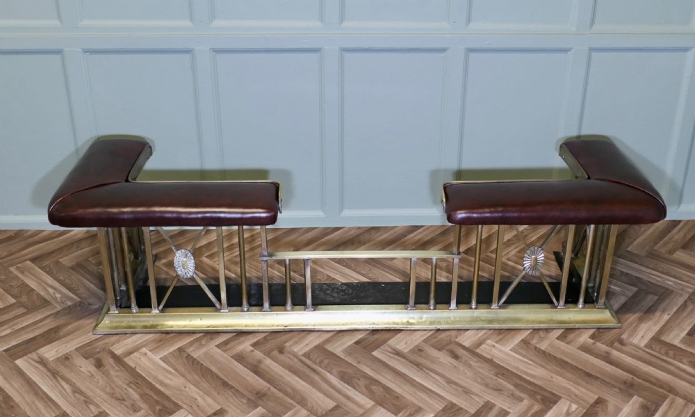 A Large Victorian Brass and Leather Club Fender View II