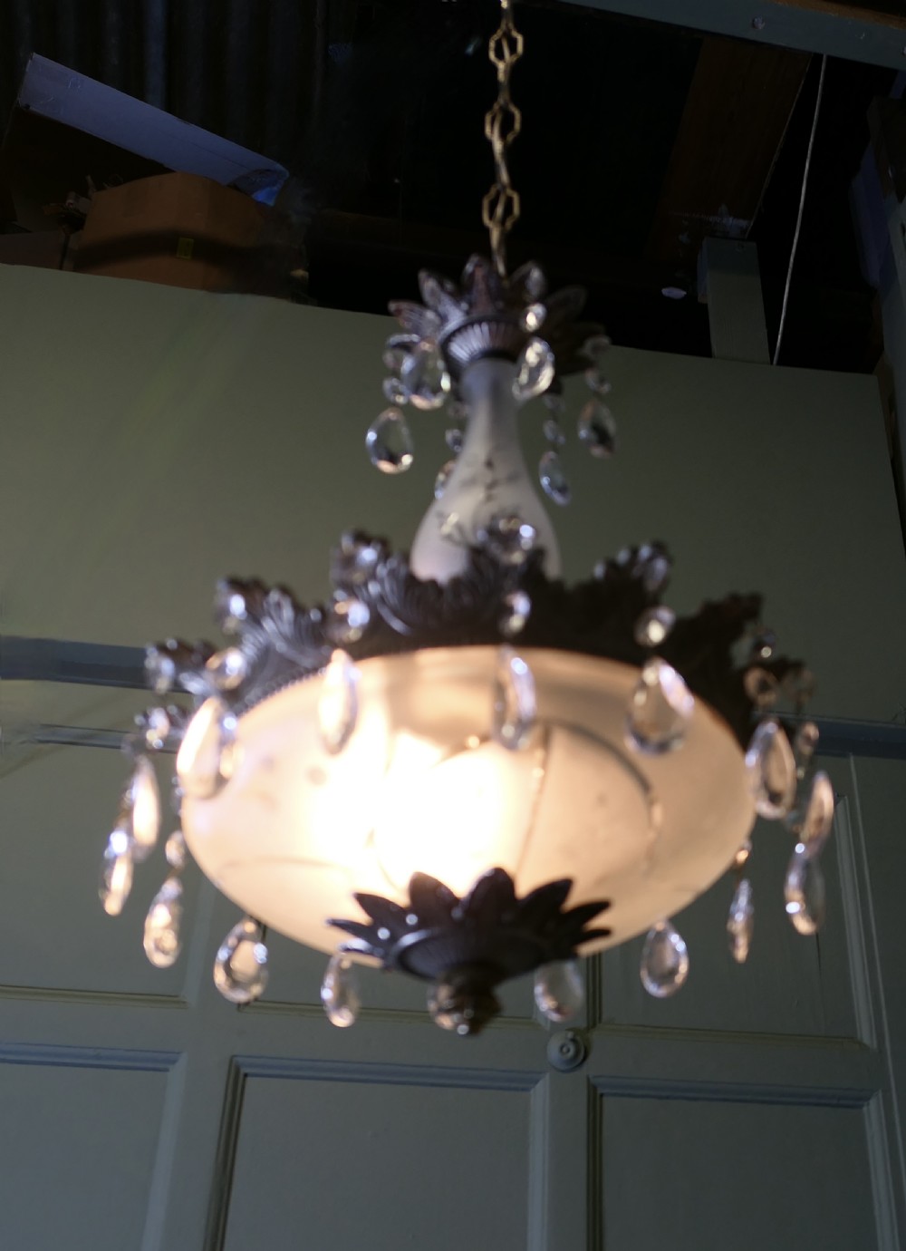An illuminated Arts and Crafts style ceiling chandelier featuring a frosted glass bowl shade suspended by a brass chain, adorned with clear glass crystal droplets and an etched central glass spindle. View II
