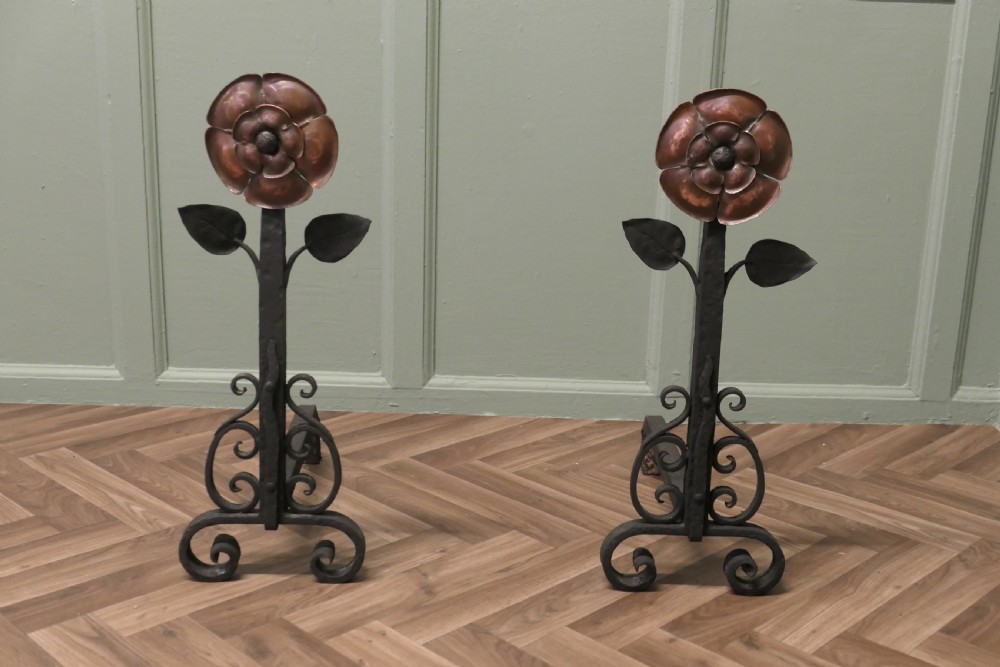 A Pair of Large Arts and Crafts Copper and Iron Andirons or Fire Dogs