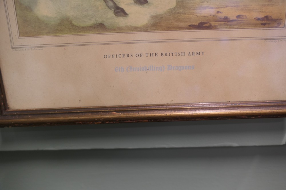 A set of five framed antique prints depicting British Army cavalry officers in uniform mounted on horses. View V