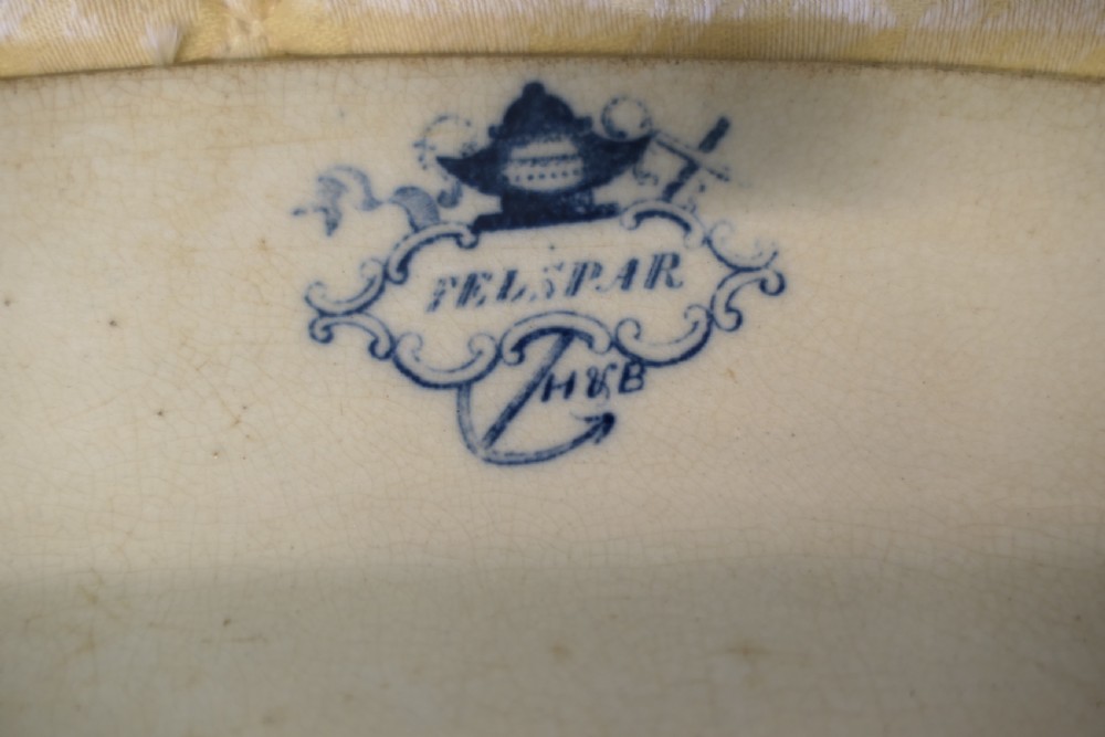 An oval Victorian ironstone meat platter featuring a cobalt blue Willow transferware pattern on a white glazed ceramic ground. View VII
