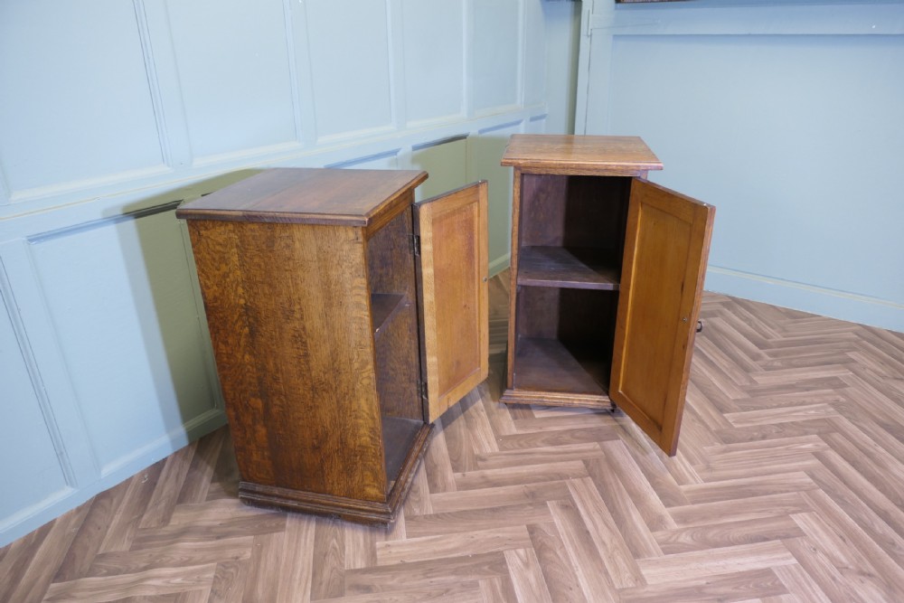 A Pair of Arts and Crafts Oak Bedside Cupboards View II