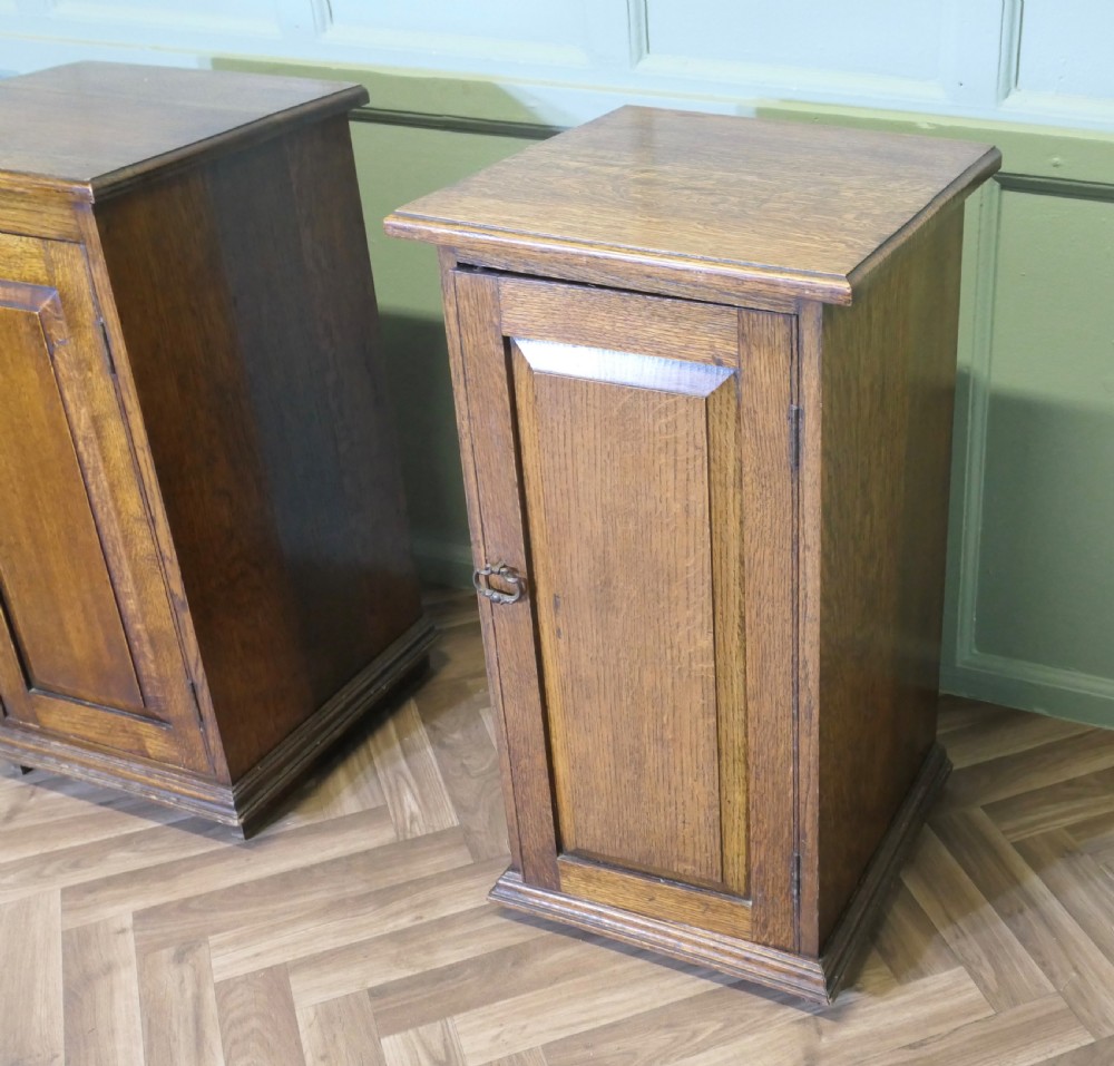 A Pair of Arts and Crafts Oak Bedside Cupboards View V