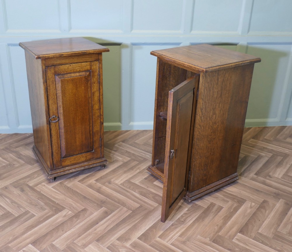 A Pair of Arts and Crafts Oak Bedside Cupboards View VII