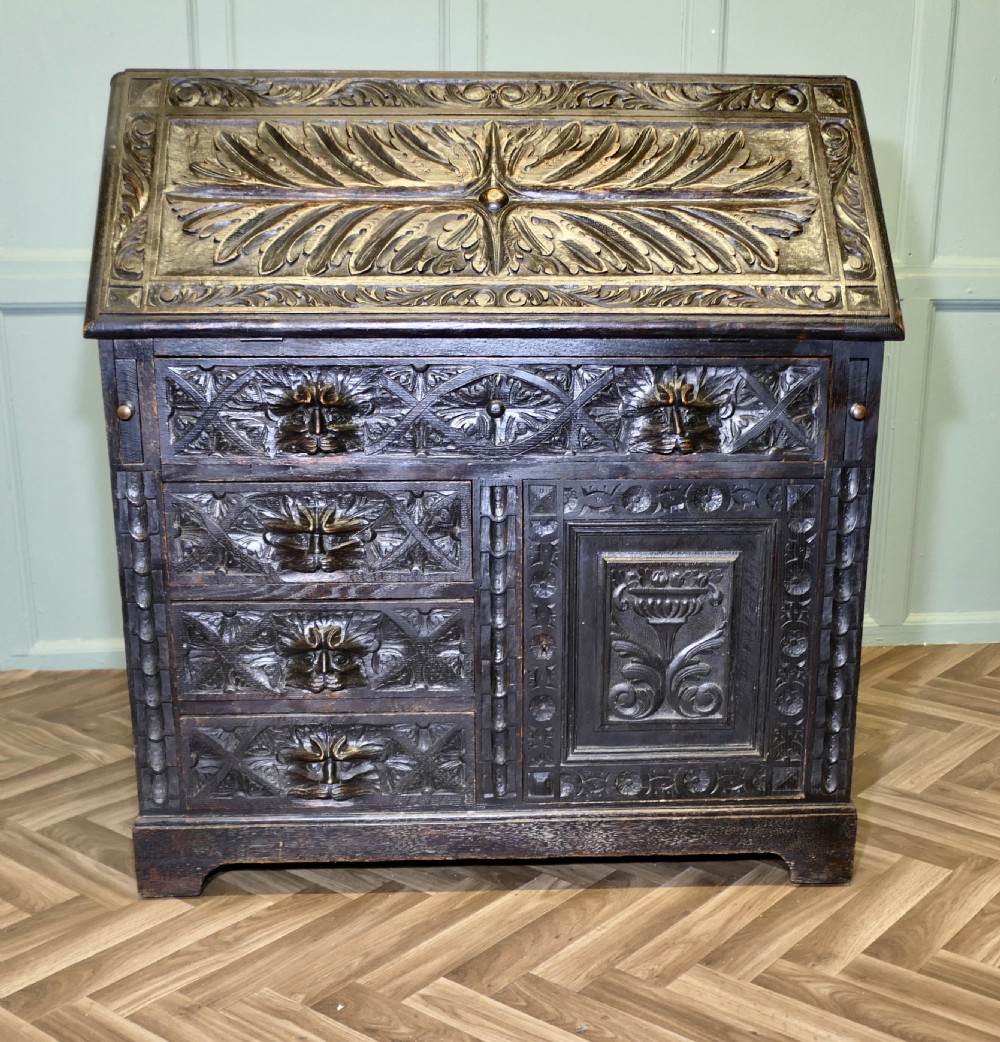 A Victorian Green Man Carved Oak Bureau  View V