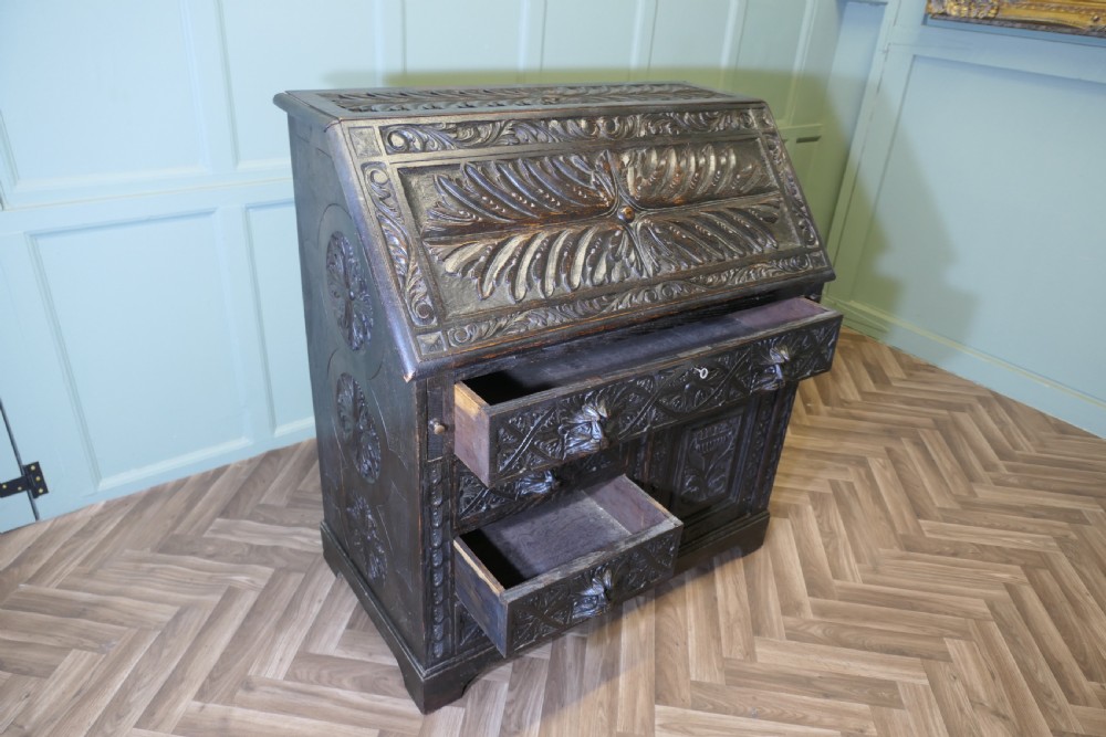 A Victorian Green Man Carved Oak Bureau  View VI