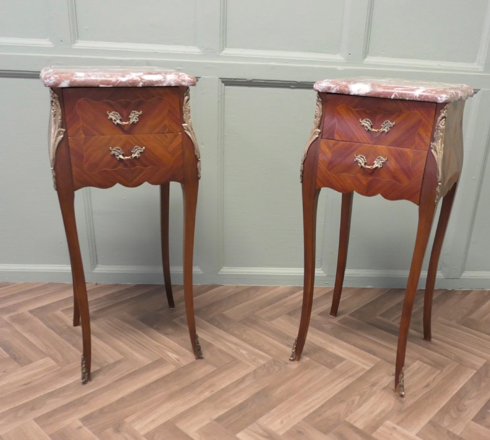 A Pair of French Bombe Style Bedside Tables