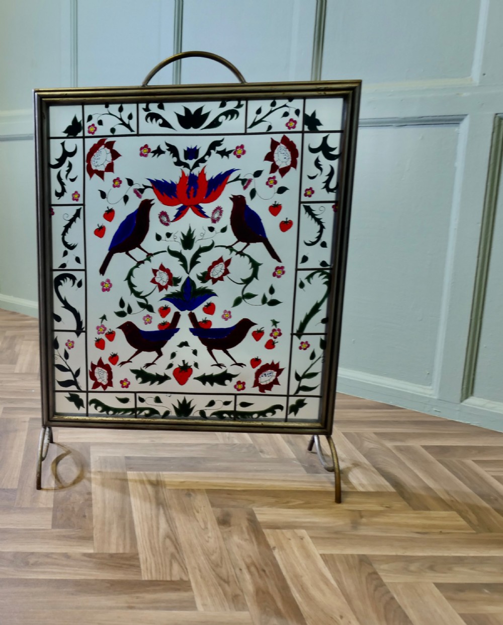 A Victorian Art Nouveau Painted Glass Fire Screen