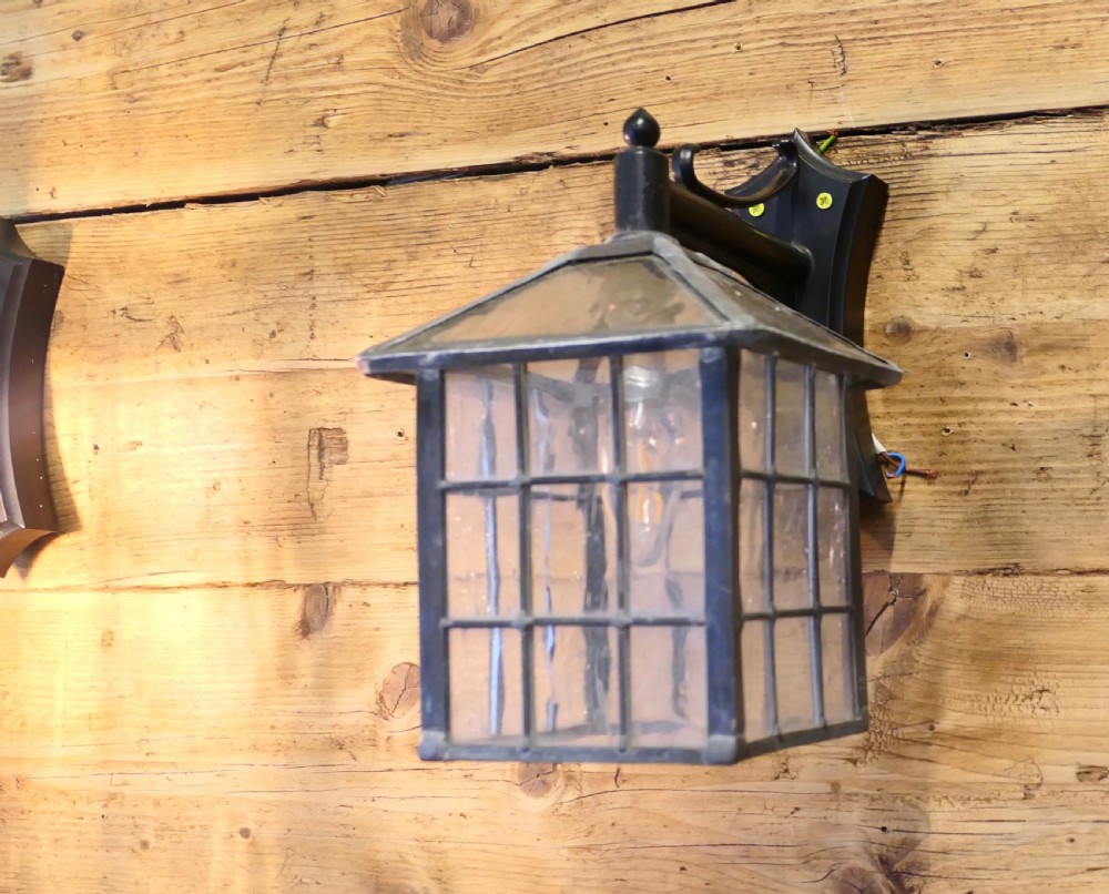 A Superb Pair of Leaded Glass Wall Lanterns View II