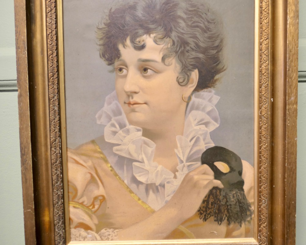 A framed oil portrait painting on board depicting a woman with short curly hair holding a black masquerade mask, dressed in a ruffled collar inside a gilded wood frame. View III
