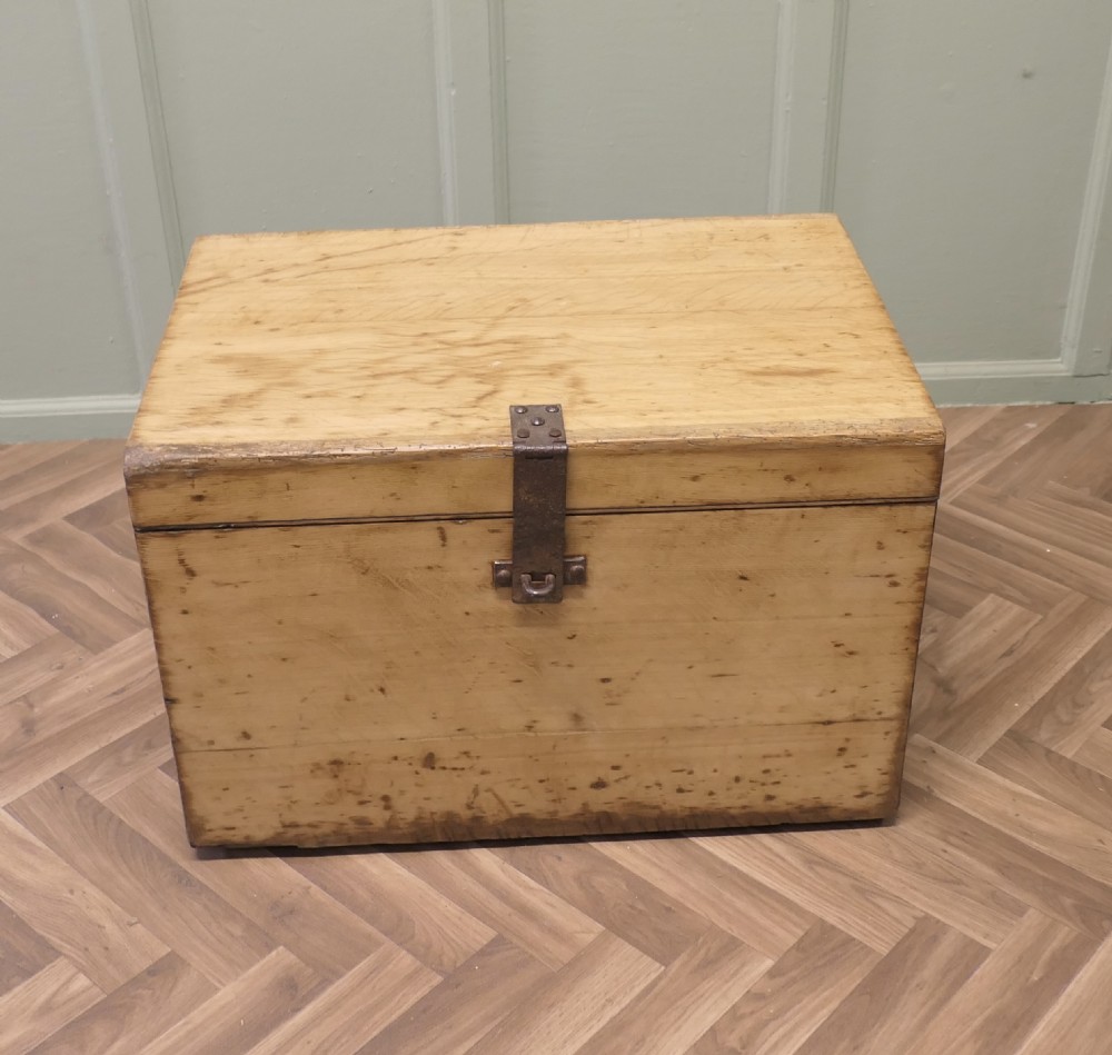 A rectangular golden oak travelling silver chest featuring a hinged lid and central iron locking latch. View III