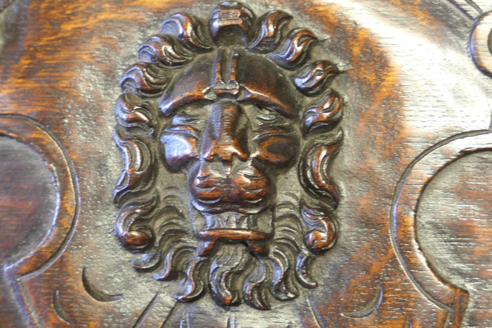 19th Century Carved Oak Mirror Back Dresser with Green Man Carvings View IV