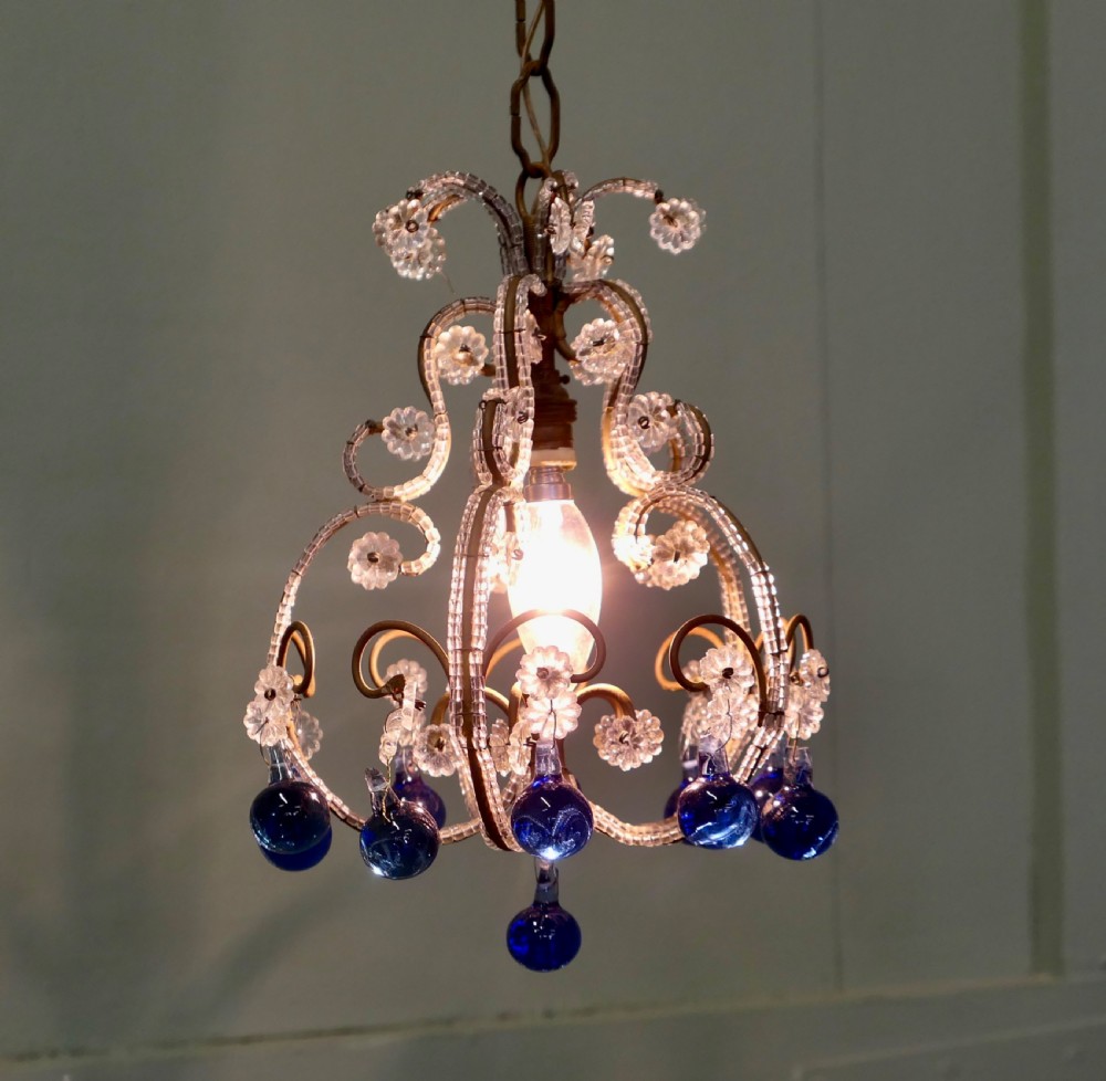 A compact French ceiling light featuring a wire frame adorned with clear glass beads and flower motifs, finished with hanging cobalt blue glass droplets. View II