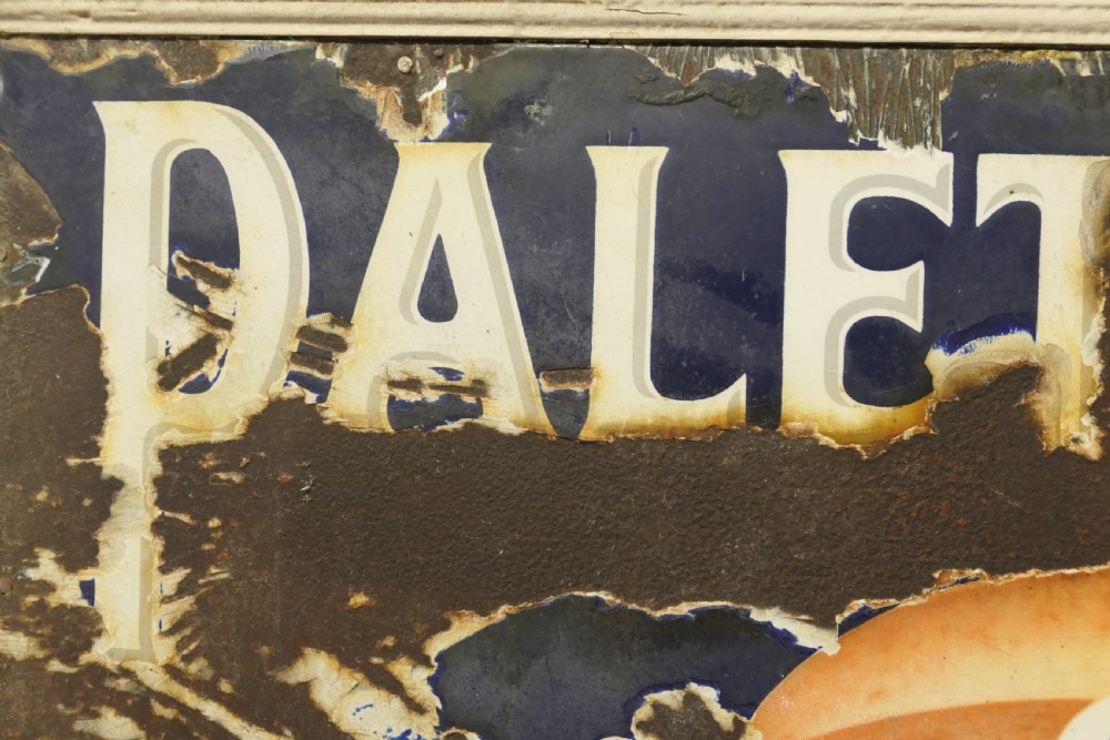 A framed early twentieth-century blue vitreous enamel advertising sign with bold lettering for Palethorpes and a central illustration of packaged sausages. View II
