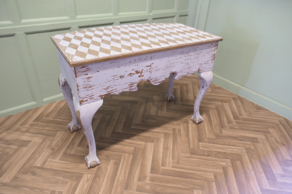 An eighteenth-century style painted bow-front console table featuring a diamond-pattern top, carved shell knees, claw-and-ball feet, and brass drawer handles. View VII