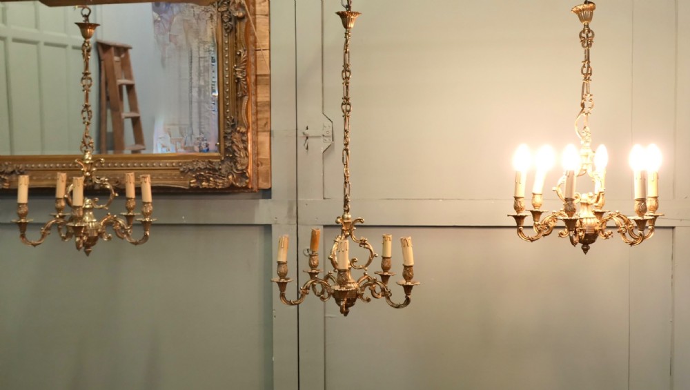 A Set of 3 French Gilded Brass Chandeliers View VI