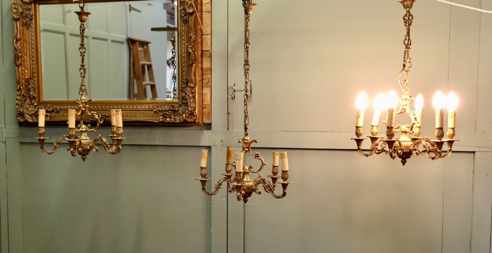 A Set of 3 French Gilded Brass Chandeliers