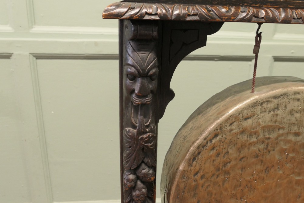 A Large Gothic Carved Oak and Brass Dinner Gong View III