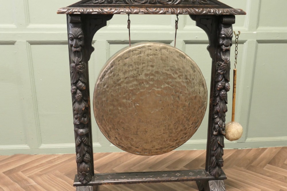 A Large Gothic Carved Oak and Brass Dinner Gong View IV