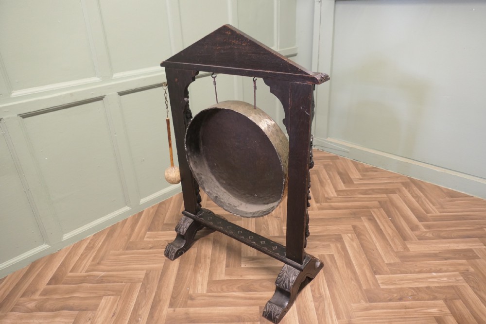 A Large Gothic Carved Oak and Brass Dinner Gong View V