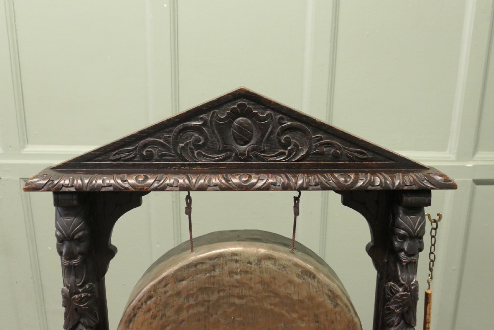 A Large Gothic Carved Oak and Brass Dinner Gong View VI