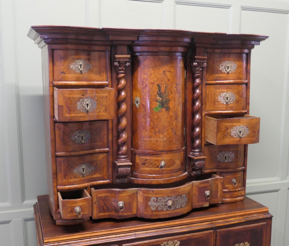 A Baroque burr walnut tabletop escritoire cabinet with a central revolving tabernacle flanked by barley-twist columns and small side drawers. View VI