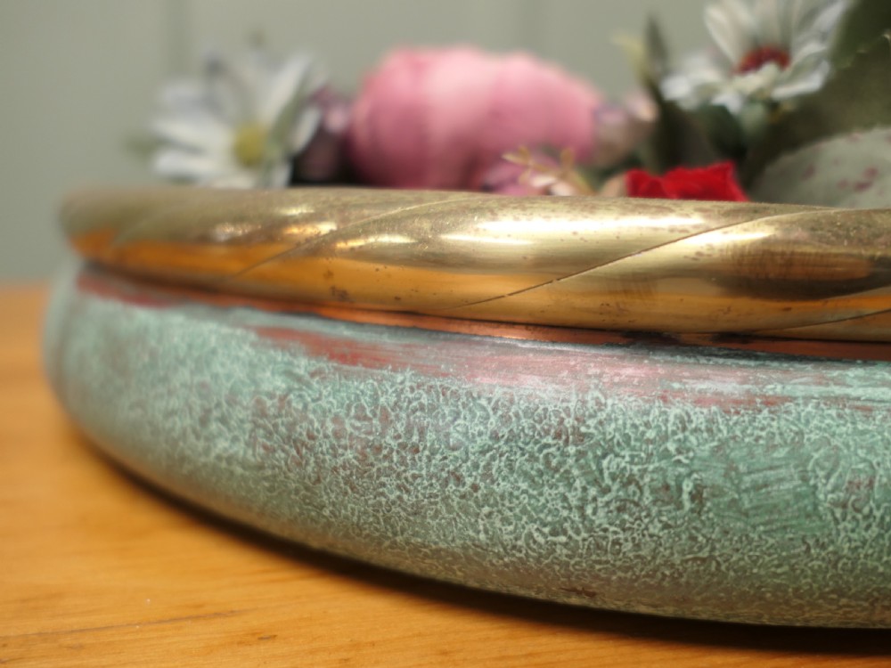 A round French copper rose bowl featuring a green verdigris finish and a polished brass rope-twist rim. View III