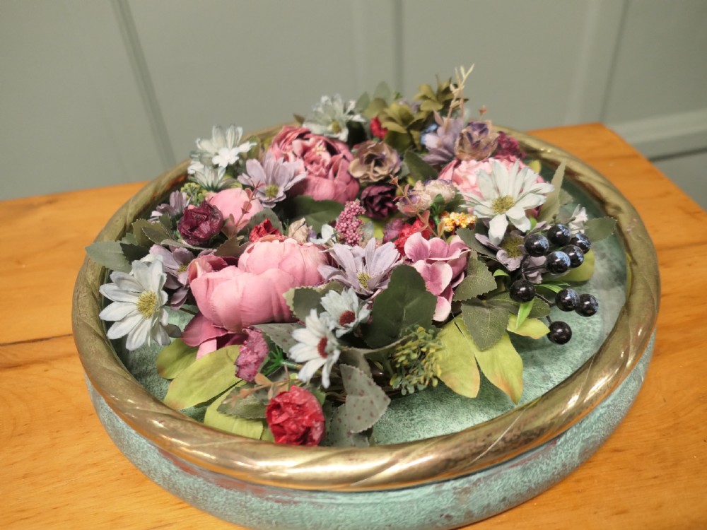 A round French copper rose bowl featuring a green verdigris finish and a polished brass rope-twist rim. View VII