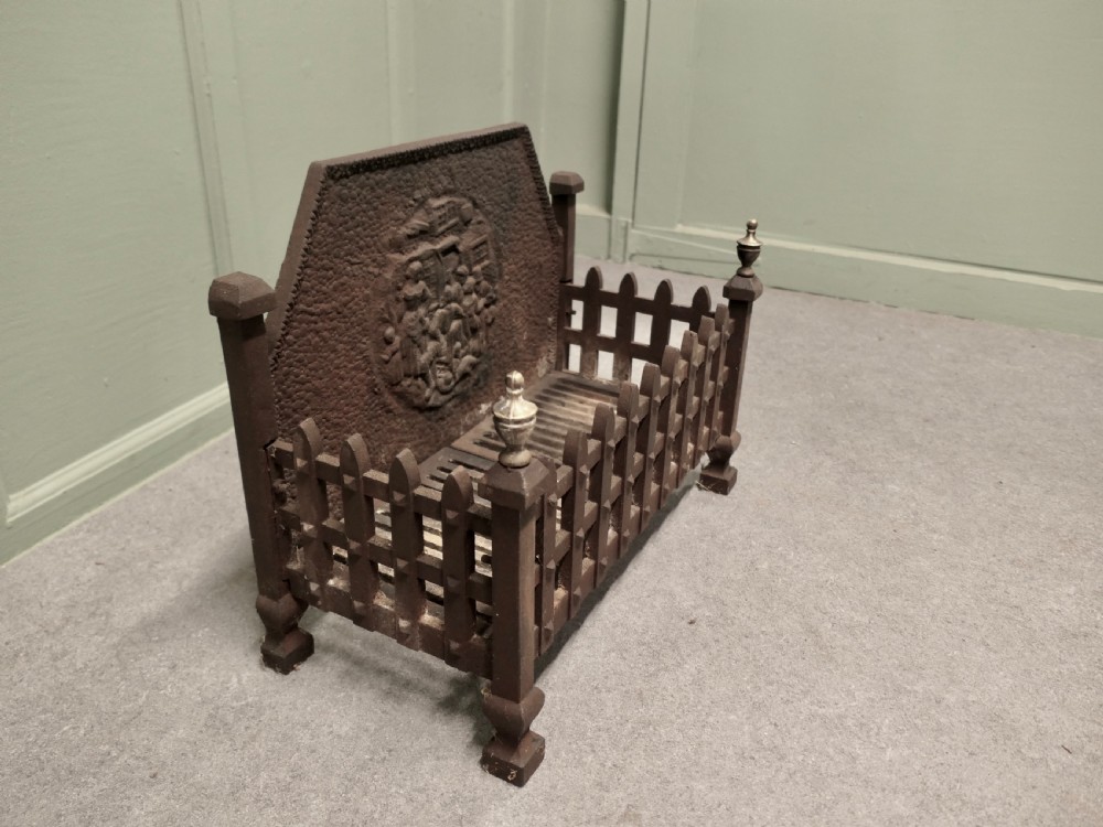 A Large Iron Fire Grate View V