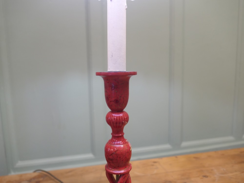 A red painted wooden table lamp featuring an open barley twist stem and a pleated cream lampshade. View III