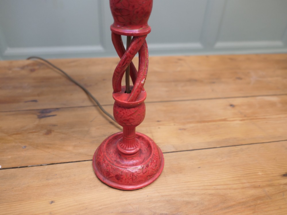 A red painted wooden table lamp featuring an open barley twist stem and a pleated cream lampshade. View VII