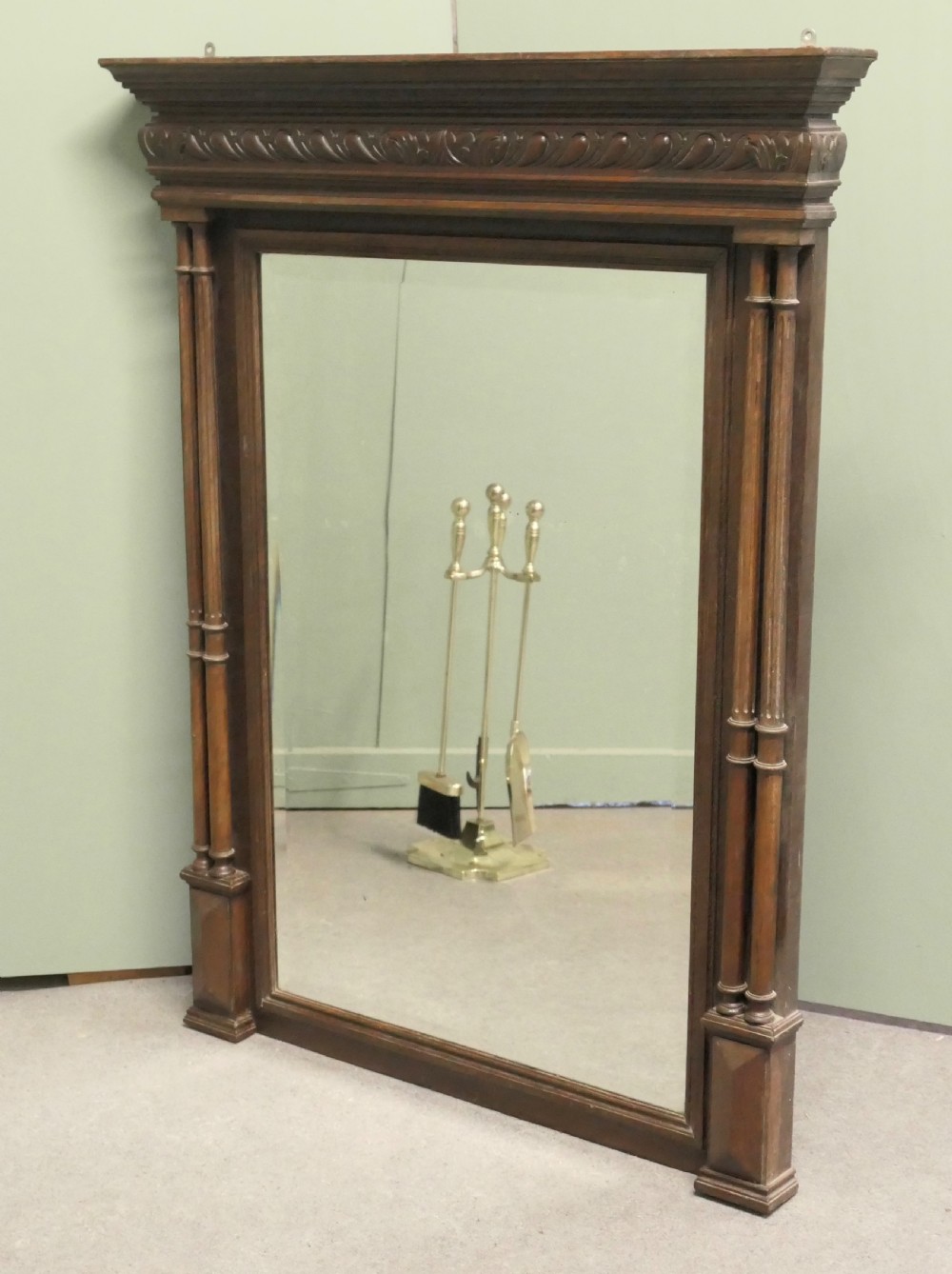 A dark oak rectangular wall mirror featuring an architectural carved cornice and twin slender columns flanking the glass plate. View II